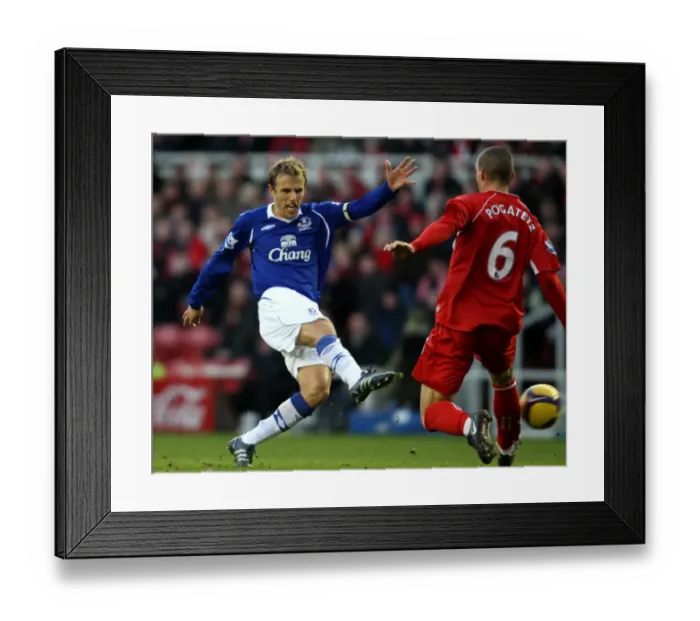 Framed Print : Phil Neville vs Emanuel Pogatetz: A Premier League Showdown at Riverside Stadium (08 / 09) Framed Print : Phil Neville vs Emanuel Pogatetz: A Premier League Showdown at Riverside Stadium (08 / 09)