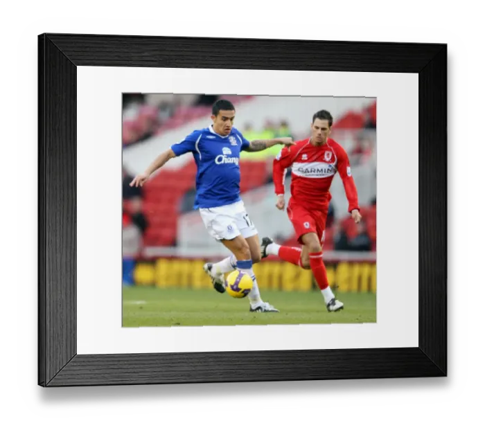 Framed Print : Intense Rivalry: Tim Cahill vs. Jeremie Aliadiere Battle at The Riverside Stadium - Middlesbrough vs. Everton, Barclays Premier League, December 2008 Framed Print : Intense Rivalry: Tim Cahill vs. Jeremie Aliadiere Battle at The Riverside Stadium - Middlesbrough vs. Everton, Barclays Premier League, December 2008