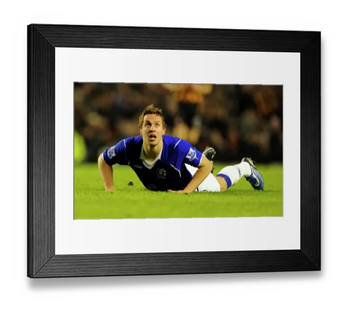 Framed Print : Everton's Jagielka in Defeat: Everton v Hull City, 2009 Premier League Framed Print : Everton's Jagielka in Defeat: Everton v Hull City, 2009 Premier League