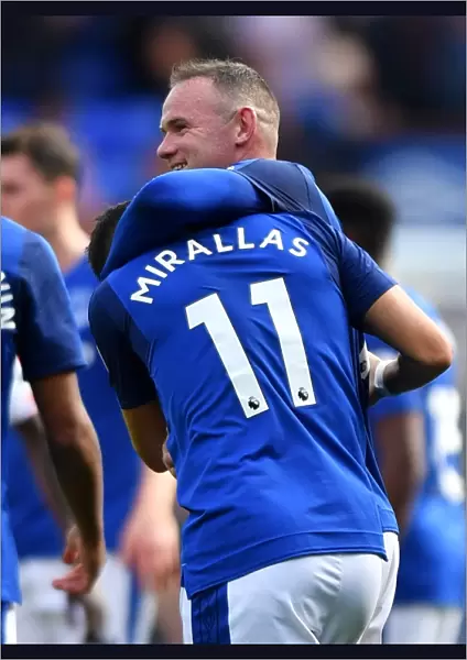 Everton's Rooney and Mirallas Celebrate Premier League Victory over Stoke City at Goodison Park (Season 2017-18)