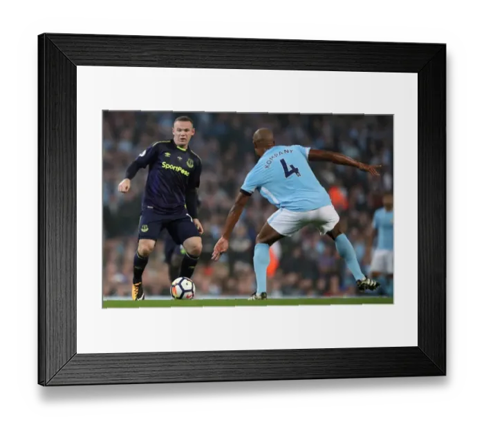 Framed Print : Rooney vs. Kompany: Intense Battle for Ball at Etihad Stadium - Manchester City vs. Everton, Premier League Framed Print : Rooney vs. Kompany: Intense Battle for Ball at Etihad Stadium - Manchester City vs. Everton, Premier League