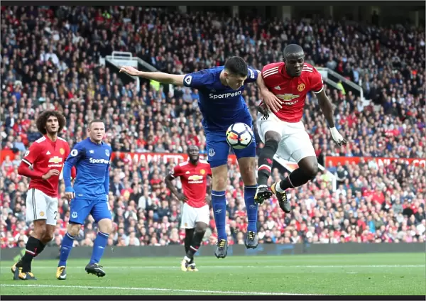 Manchester United vs. Everton: Intense Battle for the Ball between Eric Bailly and Michael Keane (Premier League, 2017-18)