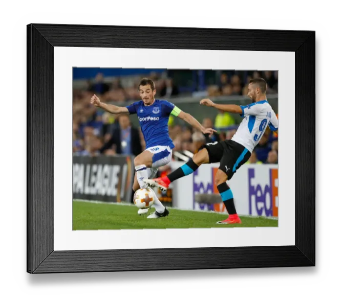Framed Print : Everton vs Apollon Limassol: Leighton Baines vs Antonio Jakolis - UEFA Europa League Group E Clash at Goodison Park