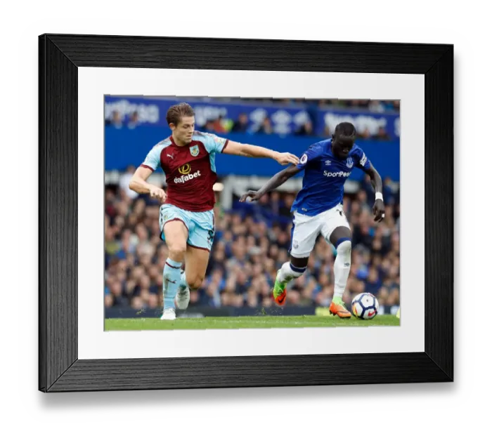 Framed Print : Intense Rivalry: Niasse vs. Tarkowski - Everton vs. Burnley at Goodison Park Framed Print : Intense Rivalry: Niasse vs. Tarkowski - Everton vs. Burnley at Goodison Park