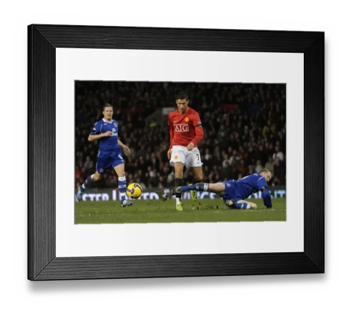Framed Print : Ronaldo vs. Hibbert: Clash of the Titans in Manchester United vs. Everton (08 / 09) Premier League Framed Print : Ronaldo vs. Hibbert: Clash of the Titans in Manchester United vs. Everton (08 / 09) Premier League