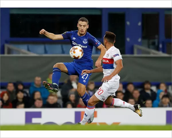Everton vs. Olympique Lyonnais - Group E Clash: A Battle for the Ball (Nikola Vlasic vs. Marcal)