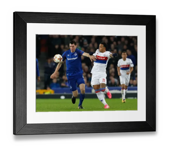 Framed Print : Keane vs. Depay: Battle for the Ball in Europa League Group E - Everton vs. Olympique Lyonnais at Goodison Park Framed Print : Keane vs. Depay: Battle for the Ball in Europa League Group E - Everton vs. Olympique Lyonnais at Goodison Park