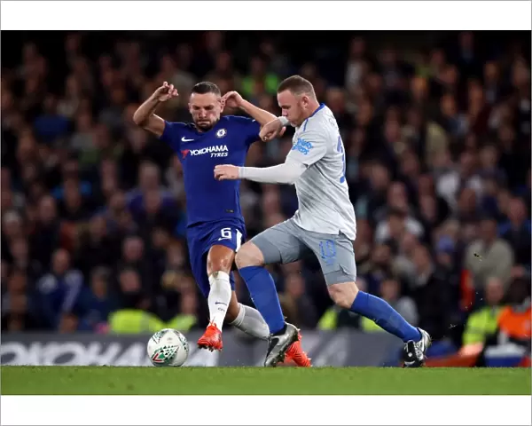 Drinkwater vs Rooney: Battle for the Ball in the Carabao Cup Fourth Round at Stamford Bridge (Chelsea vs Everton)