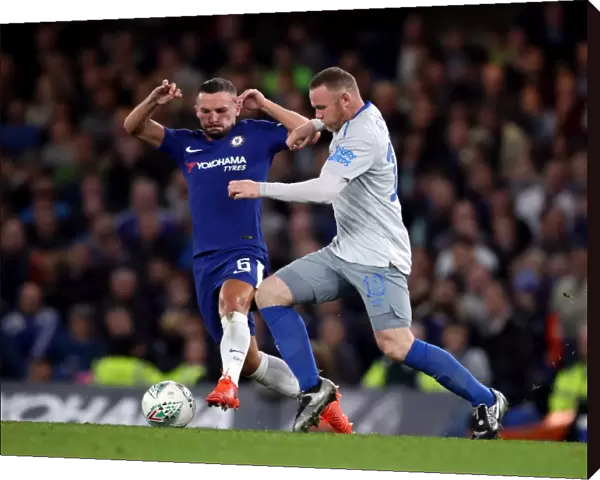 Drinkwater vs Rooney: Battle for the Ball in the Carabao Cup Fourth Round at Stamford Bridge (Chelsea vs Everton)