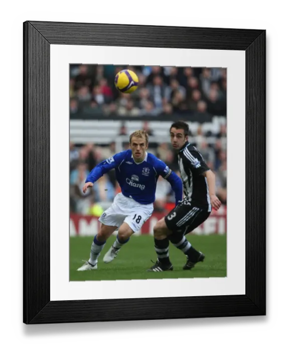 Framed Print : Phil Neville vs Jose Enrique: Everton vs Newcastle United - Barclays Premier League Clash at St James Park, February 2009 Framed Print : Phil Neville vs Jose Enrique: Everton vs Newcastle United - Barclays Premier League Clash at St James Park, February 2009