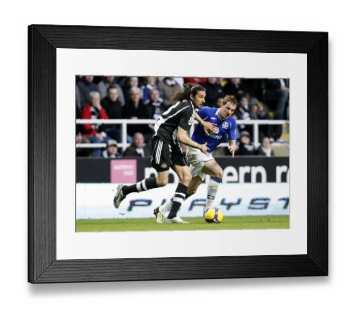 Framed Print : Phil Jagielka vs. Jonas Gutierrez: Everton vs. Newcastle United - Barclays Premier League Clash at St James Park (February 2009) Framed Print : Phil Jagielka vs. Jonas Gutierrez: Everton vs. Newcastle United - Barclays Premier League Clash at St James Park (February 2009)