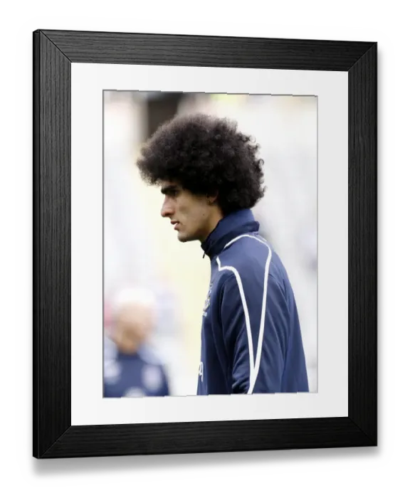 Framed Print : Marouane Fellaini's Unwavering Focus: Everton Star's Pre-Match Ritual at St. James Park (Newcastle v Everton, Barclays Premier League, 2008-2009) Framed Print : Marouane Fellaini's Unwavering Focus: Everton Star's Pre-Match Ritual at St. James Park (Newcastle v Everton, Barclays Premier League, 2008-2009)