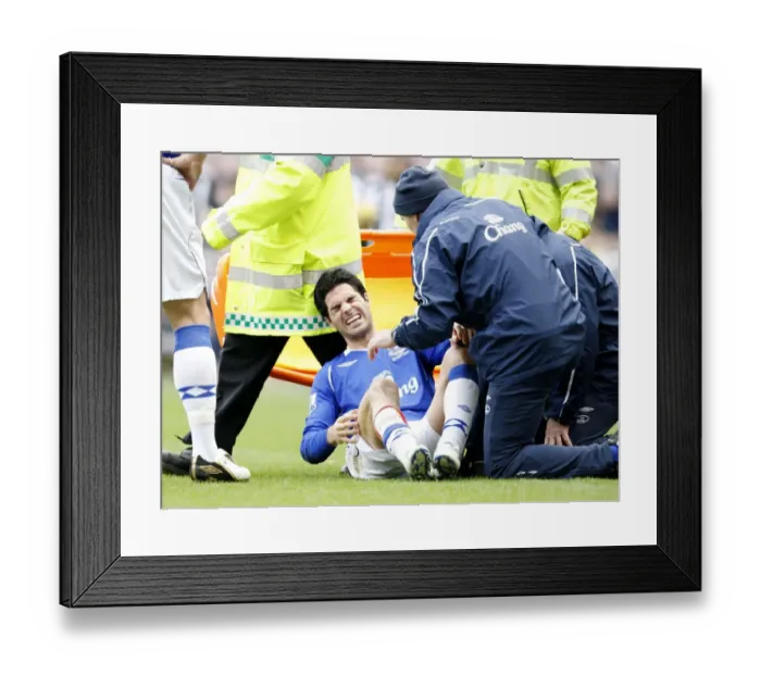 Framed Print : Mikel Arteta Suffers Injury: Everton's Star Midfielder Carried Off in Newcastle Clash, Barclays Premier League (2009) Framed Print : Mikel Arteta Suffers Injury: Everton's Star Midfielder Carried Off in Newcastle Clash, Barclays Premier League (2009)