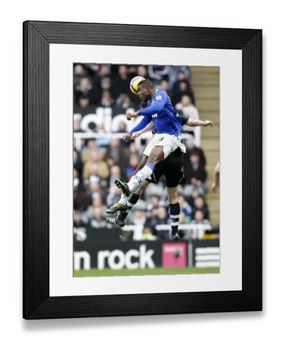 Framed Print : Anichebe vs Newcastle: Everton Footballer in Action during Barclays Premier League Clash, 2009 Framed Print : Anichebe vs Newcastle: Everton Footballer in Action during Barclays Premier League Clash, 2009
