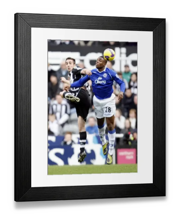 Framed Print : Anichebe vs Enrique: Everton vs Newcastle United, Barclays Premier League, 2009 - A Clash at St James Park Framed Print : Anichebe vs Enrique: Everton vs Newcastle United, Barclays Premier League, 2009 - A Clash at St James Park