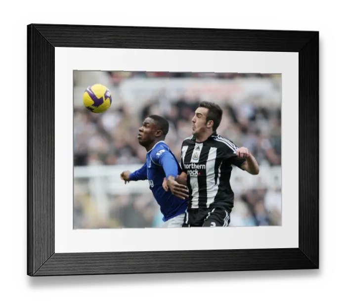 Framed Print : Enrique vs Anichebe: Intense Clash between Newcastle and Everton in Barclays Premier League Framed Print : Enrique vs Anichebe: Intense Clash between Newcastle and Everton in Barclays Premier League