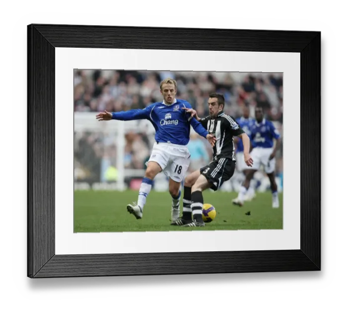 Framed Print : Clash of the Titans: Neville vs Enrique - Everton vs Newcastle United, Barclays Premier League Framed Print : Clash of the Titans: Neville vs Enrique - Everton vs Newcastle United, Barclays Premier League