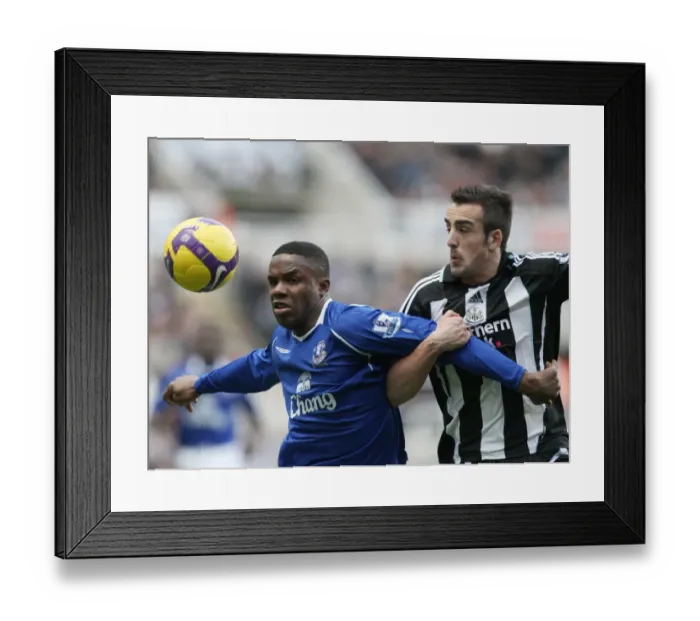 Framed Print : Anichebe vs Enrique: A Fierce Battle at St. James Park - Newcastle United vs Everton, Barclays Premier League, 2009 Framed Print : Anichebe vs Enrique: A Fierce Battle at St. James Park - Newcastle United vs Everton, Barclays Premier League, 2009