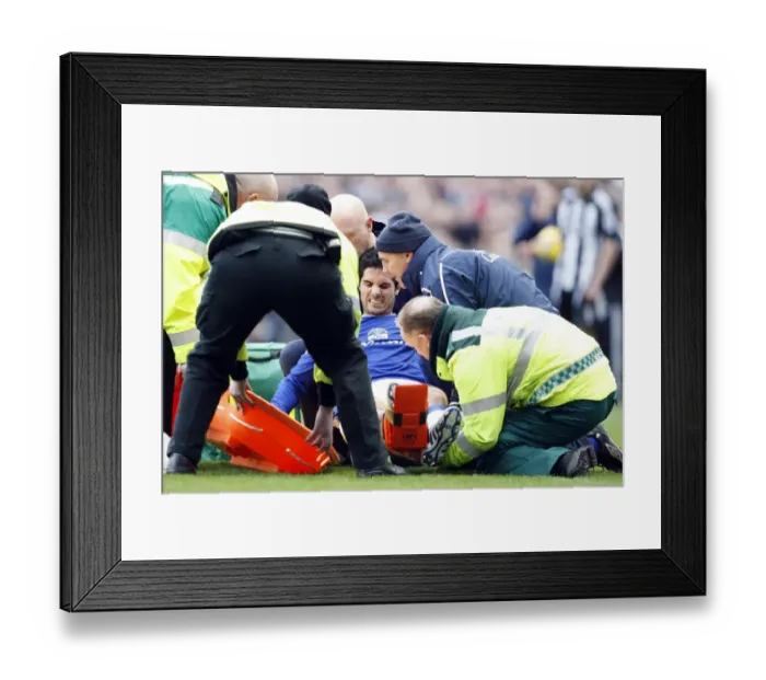 Framed Print : Mikel Arteta's Injury: Everton Star Carried Off in Pain during Newcastle United vs. Everton, 2009 Framed Print : Mikel Arteta's Injury: Everton Star Carried Off in Pain during Newcastle United vs. Everton, 2009
