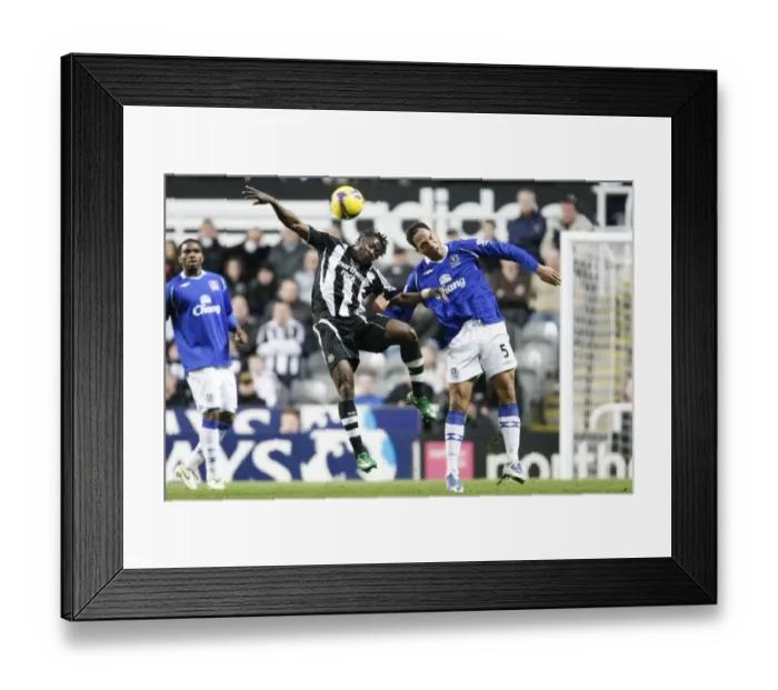 Framed Print : Martins vs. Lescott: Clash between Newcastle and Everton in Barclays Premier League Framed Print : Martins vs. Lescott: Clash between Newcastle and Everton in Barclays Premier League