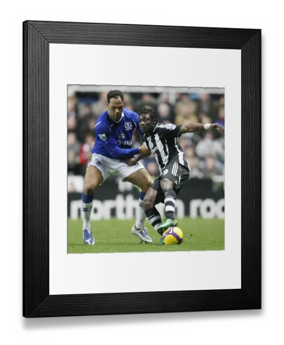 Framed Print : Martins vs. Lescott: Battle at St. James Park - Newcastle United vs. Everton, Barclays Premier League Framed Print : Martins vs. Lescott: Battle at St. James Park - Newcastle United vs. Everton, Barclays Premier League