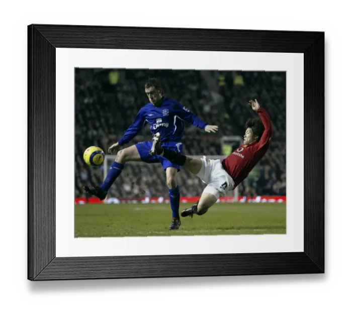 Framed Print : James McFadden's Unyielding Control: Holding His Ground Against Ji Sung Park's Challenges Framed Print : James McFadden's Unyielding Control: Holding His Ground Against Ji Sung Park's Challenges