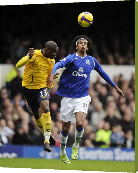 Intense Rivalry: Everton vs. West Bromwich Albion, Premier League 2009 - A Clash between Jo and Meite at Goodison Park