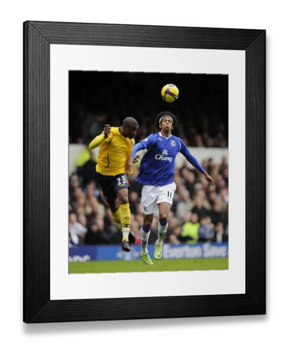 Framed Print : Intense Rivalry: Everton vs. West Bromwich Albion, Premier League 2009 - A Clash between Jo and Meite at Goodison Park
