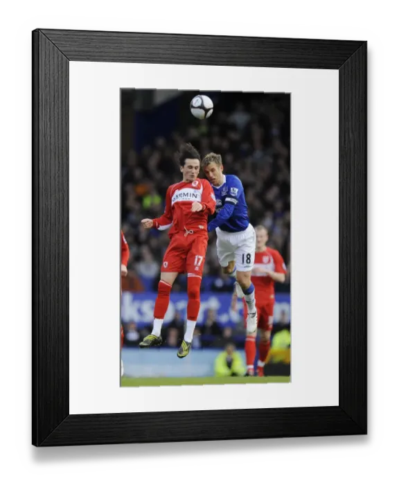 Framed Print : Neville vs Sanli Showdown: Everton vs Middlesbrough FA Cup Quarterfinal at Goodison Park Framed Print : Neville vs Sanli Showdown: Everton vs Middlesbrough FA Cup Quarterfinal at Goodison Park