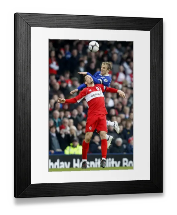Framed Print : Neville vs Pogatetz: Everton vs Middlesbrough FA Cup Quarterfinal Showdown at Goodison Park Framed Print : Neville vs Pogatetz: Everton vs Middlesbrough FA Cup Quarterfinal Showdown at Goodison Park