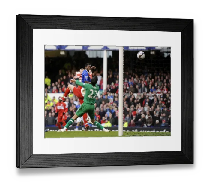 Framed Print : Everton's FA Cup Triumph: Louis Saha Scores the Decisive Goal vs. Middlesbrough (March 8, 2009) Framed Print : Everton's FA Cup Triumph: Louis Saha Scores the Decisive Goal vs. Middlesbrough (March 8, 2009)