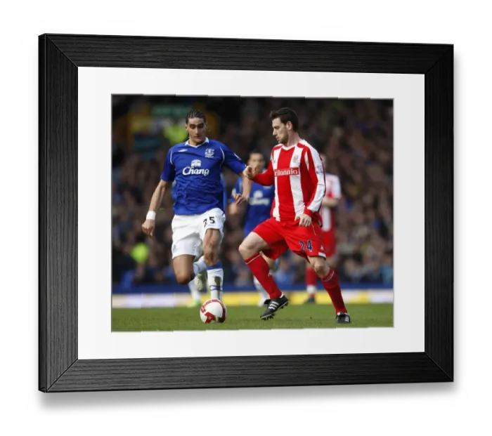 Framed Print : Fellaini vs. Delap: A Battle at Goodison Park, Everton vs. Stoke City, Barclays Premier League, March 2009 Framed Print : Fellaini vs. Delap: A Battle at Goodison Park, Everton vs. Stoke City, Barclays Premier League, March 2009