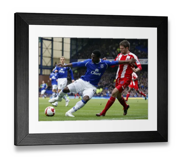 Framed Print : Yobo vs Beattie: Intense Rivalry in Everton vs Stoke City Barclays Premier League Clash, 14 / 3 / 09 Framed Print : Yobo vs Beattie: Intense Rivalry in Everton vs Stoke City Barclays Premier League Clash, 14 / 3 / 09