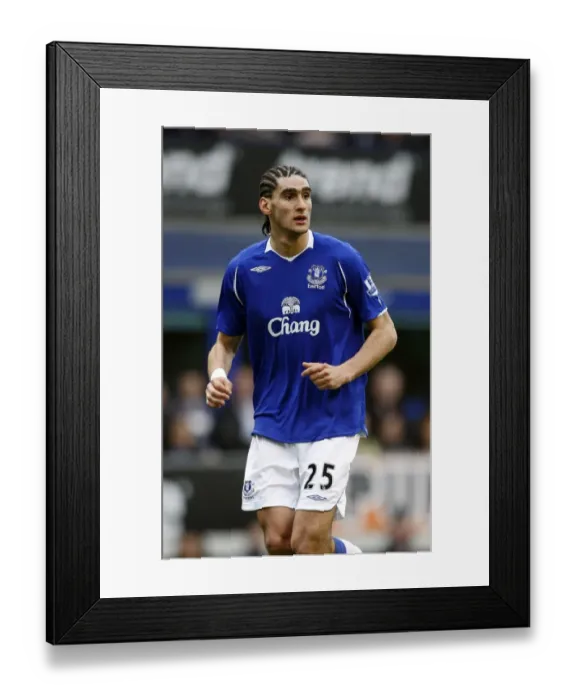 Framed Print : Everton's Marouane Fellaini in Action against Stoke City (14 / 3 / 09) Framed Print : Everton's Marouane Fellaini in Action against Stoke City (14 / 3 / 09)