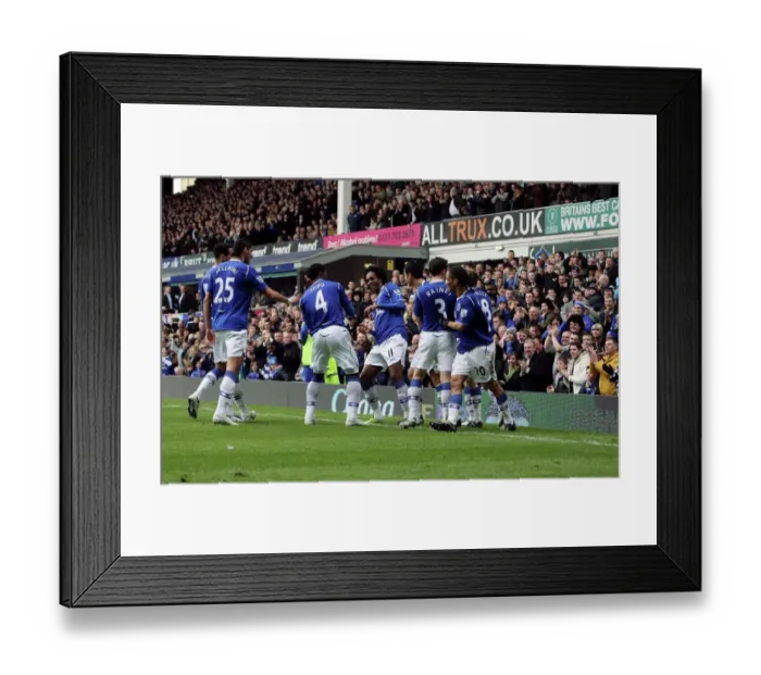 Framed Print : Evertons Joleon Lescott Scores First Goal vs Stoke City: Everton FC Team Celebration Framed Print : Evertons Joleon Lescott Scores First Goal vs Stoke City: Everton FC Team Celebration