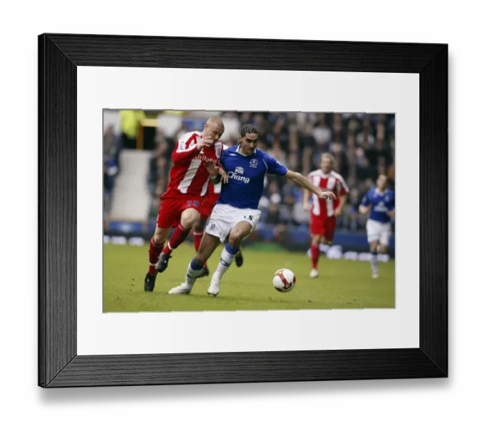 Framed Print : Fellaini vs. Wilkinson: Clash of the Titans - Everton v Stoke City, Barclays Premier League, Goodison Park, March 14, 2009 Framed Print : Fellaini vs. Wilkinson: Clash of the Titans - Everton v Stoke City, Barclays Premier League, Goodison Park, March 14, 2009