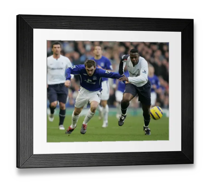 Framed Print : McFadden vs. N'Gotty: A Football Sprint at Everton Framed Print : McFadden vs. N'Gotty: A Football Sprint at Everton