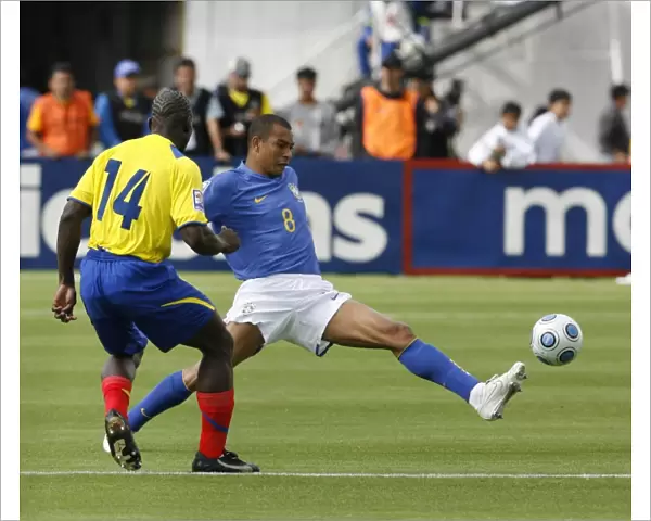 Ecuadors Castillo fights for ball with Brazils Silva during their 2010 World Cup qualifying soccer match in Quito