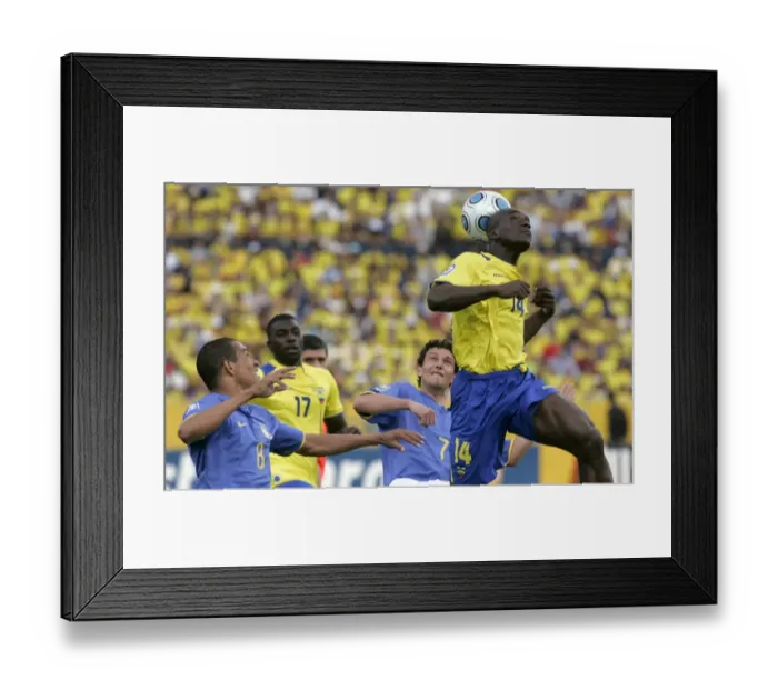 Framed Print : Ecuadors Segundo Castillo heads the ball during their World Cup 2010 qualifying soccer match against Brazil in Quito Framed Print : Ecuadors Segundo Castillo heads the ball during their World Cup 2010 qualifying soccer match against Brazil in Quito
