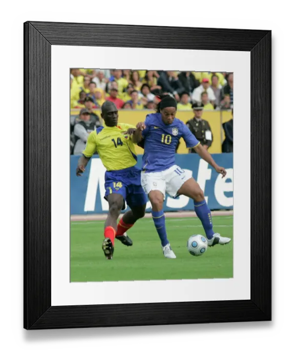 Framed Print : Ecuadors Castillo fights for the ball Brazils Ronaldinho during their World Cup qualifier soccer match in Quito Framed Print : Ecuadors Castillo fights for the ball Brazils Ronaldinho during their World Cup qualifier soccer match in Quito