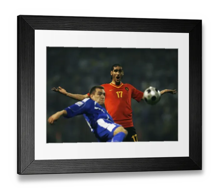 Framed Print : Marouane Fellaini-Bakkioui of Belgium reacts as Boris Pandza of Bosnia kicks the ball during their World Cup 2010 qualifying soccer match in Zenica Framed Print : Marouane Fellaini-Bakkioui of Belgium reacts as Boris Pandza of Bosnia kicks the ball during their World Cup 2010 qualifying soccer match in Zenica