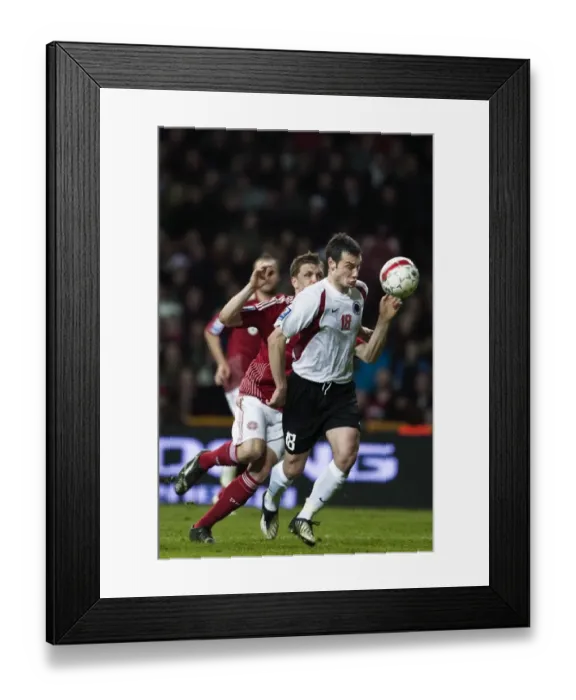 Framed Print : Denmarks Michael Jacobsen and Albanias Hamdi Salihi fight for the ball during their 2010 World Cup qualifying soccer match in Copenhagen Framed Print : Denmarks Michael Jacobsen and Albanias Hamdi Salihi fight for the ball during their 2010 World Cup qualifying soccer match in Copenhagen