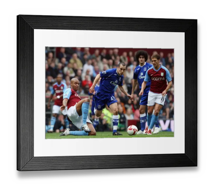 Framed Print : Intense Battle: Osman vs. Knight in Aston Villa vs. Everton Premier League Clash Framed Print : Intense Battle: Osman vs. Knight in Aston Villa vs. Everton Premier League Clash
