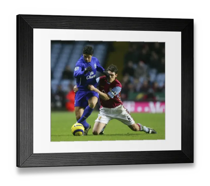 Framed Print : Mikel Arteta vs Gareth Barry: A Football Rivalry Unfolds - Aston Villa vs Everton Framed Print : Mikel Arteta vs Gareth Barry: A Football Rivalry Unfolds - Aston Villa vs Everton