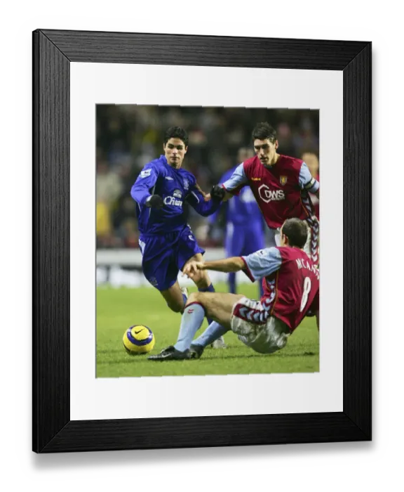 Framed Print : Mikel Arteta: Everton's Midfield Maestro Slices Through Aston Villa's Defense Framed Print : Mikel Arteta: Everton's Midfield Maestro Slices Through Aston Villa's Defense