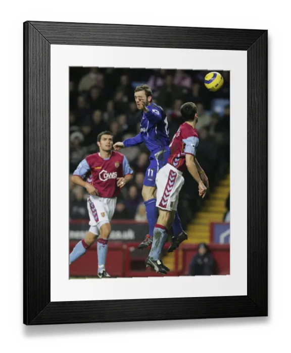 Framed Print : Clash of Heads: McFadden vs. Delaney - Everton vs. Aston Villa Rivalry: A Head-to-Head Battle Framed Print : Clash of Heads: McFadden vs. Delaney - Everton vs. Aston Villa Rivalry: A Head-to-Head Battle