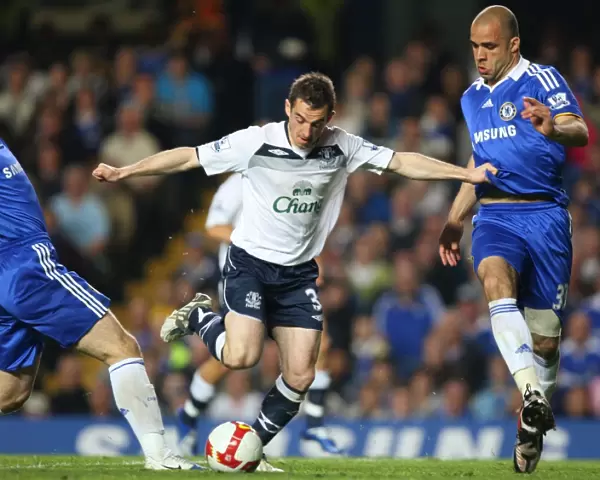 Baines vs Ivanovic and Alex: Everton's Star Defender Faces Off Against Chelsea's Duo in Intense Barclays Premier League Clash, 08 / 09 Season