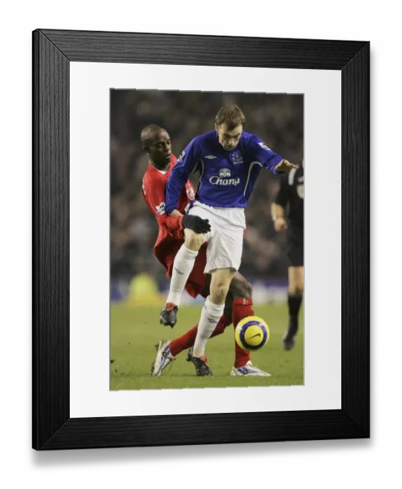 Framed Print : James McFadden vs. Mohamed Sissoko: A Moment of Skill on the Football Field Framed Print : James McFadden vs. Mohamed Sissoko: A Moment of Skill on the Football Field