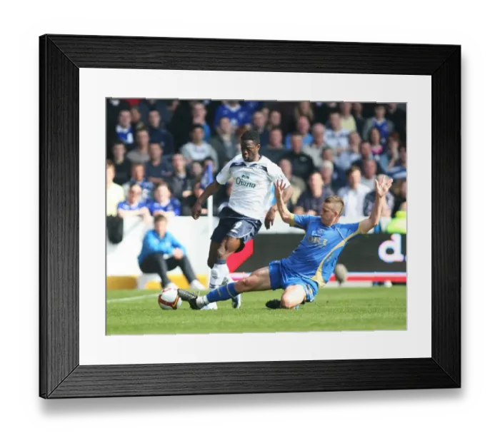 Framed Print : Intense Rivalry: Saha vs. Davis Clash at Fratton Park, March 2009 Premier League Framed Print : Intense Rivalry: Saha vs. Davis Clash at Fratton Park, March 2009 Premier League