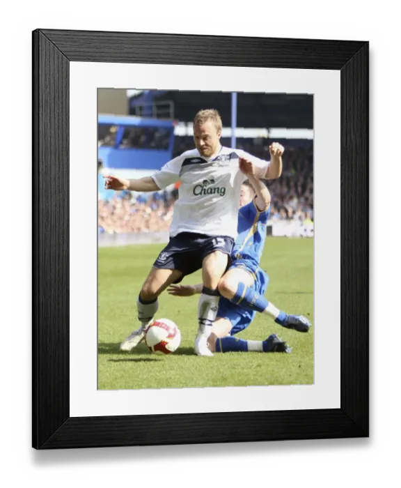 Framed Print : Everton's Lars Jacobsen in Action Against Portsmouth (08 / 09 Premier League) Framed Print : Everton's Lars Jacobsen in Action Against Portsmouth (08 / 09 Premier League)